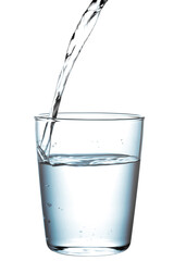 Macro shot of pouring water into a glass design element