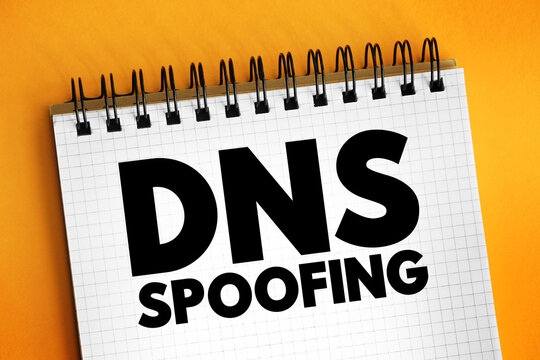 DNS Spoofing is the process of poisoning entries on a DNS server to redirect a targeted user to a malicious website, text concept on notepad