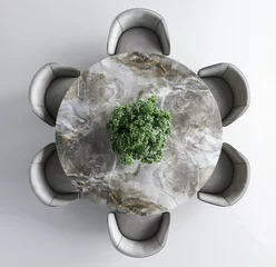 Rolgordijnen Elegant round marble dining table setup with grey modern chairs and green centerpiece from a top-down view © Robert Kneschke