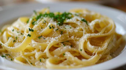 Deurstickers Close-up of delicious homemade pasta dish with fresh herbs © Robert Kneschke