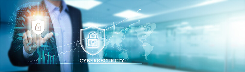 Businessman touch a circuit board to fortify cybersecurity defenses on the global network against...