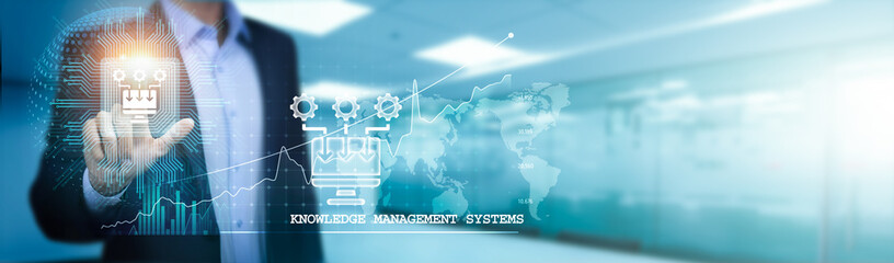 Knowledge Management Systems, Businessman touch a circuit board to facilitate efficient data...