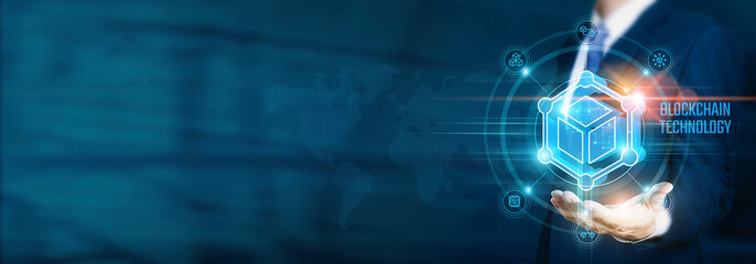 Businessman hand-holding blockchain icons with digital currency symbols and a network connection....