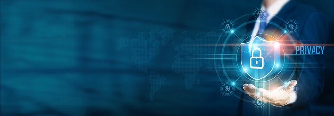 Businessman hand-holding privacy and security icons with encrypted data and network connection....
