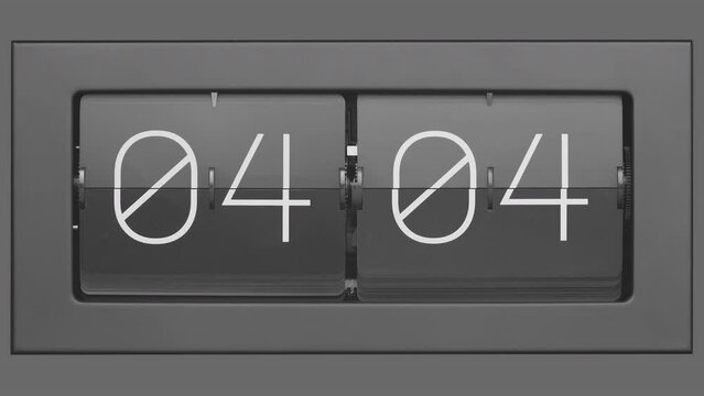 Flip clock quickly flips. Retro flip clock changing from 04:03 to 04:04. Slow motion. Close up. 