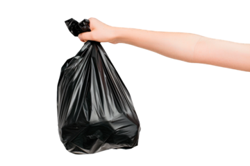 Woman's hand holding a black garbage bag isolated on a cut out PNG transparent background
