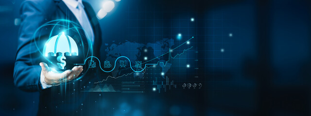 Businessman hand-holding insurance technology icons with a strong network connection. Fostering the growth of the insurance and technology businesses.