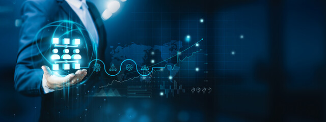 Businessman hand-holding network administration icons with seamless network connections....