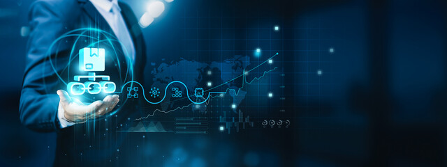 Businessman hand-holding supply chain management icons with a seamless network connection. Facilitating efficient and streamlined growth of the supply chain and associated businesses.