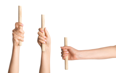 Hand holding a wooden stick from a protest on blank backgroundsign