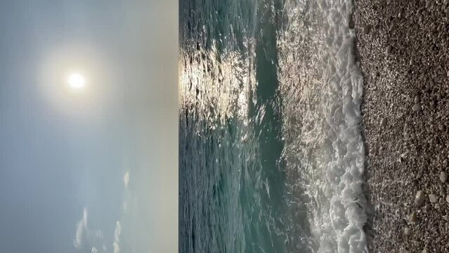 Rocky beach and crystal turquoise water of Ionian Sea in Albania