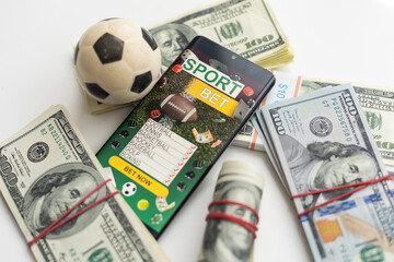 tablet pc with app for sport bets, on top of stacks of banknotes, white background, concept of online bets 3d render
