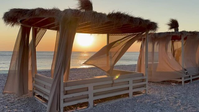 White beach canopies. Luxury beach tents at a resort.