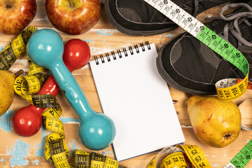 fruit for weight loss with measuring tape and equipment for exercise and diet, weight loss