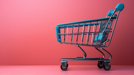A blue shopping cart is sitting on a red background. The cart is empty and has a metallic look to it - Powered by Adobe