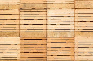 Background of close-up shots of large wooden crates for agricultural products. - obrazy, fototapety, plakaty