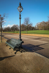 Empty park bench in hyde park, London, England, United Kingdom