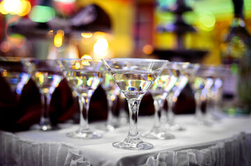Glasses of martini cocktail in a bar - obrazy, fototapety, plakaty