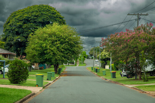 Rain and storm clouds and suburban street.