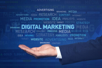 Digital marketing. Businessman showing virtual word cloud on blue background, closeup