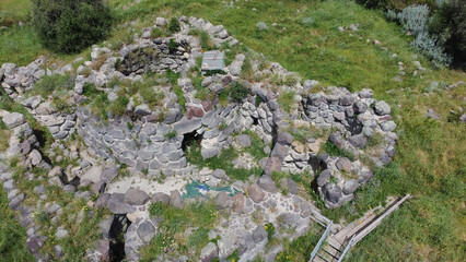 ruins of a nuraghe seen from above taken during excavations