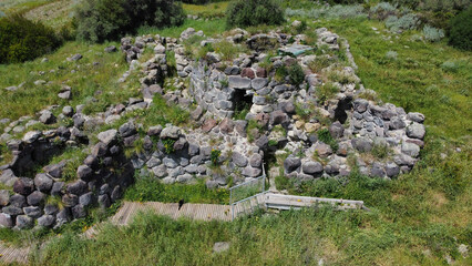 ruins of a nuraghe seen from above taken during excavations
