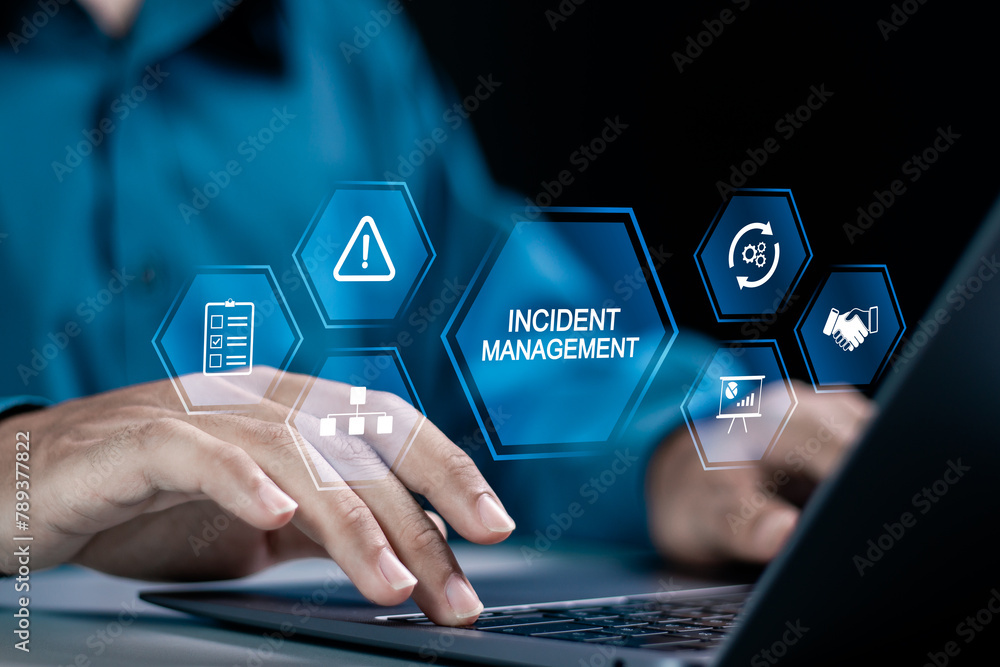 Wall mural incident management process business technology concept. businessman using laptop with incident mana