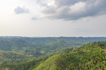 A view of the green hills in the evening  that surround the village of Vairengte in mizoram India.