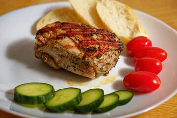 Grilled pork tenderloin meat on plate