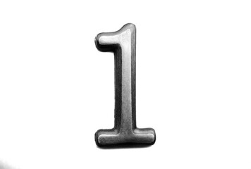 Black & white steel plaque with number ONE object backdrop - 789394086