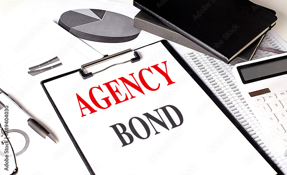 Poster agency bond text on clipboard on chart with notebook and calculator