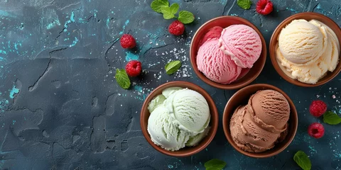 Rolgordijnen Delicious colorful ice cream scoops in bowls with fresh raspberries on blue background, summer dessert concept © SHOTPRIME STUDIO