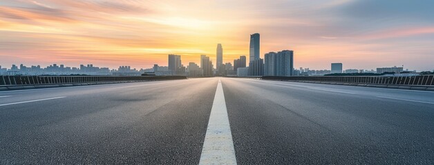 Sunrise Over Empty Highway with Cityscape - obrazy, fototapety, plakaty