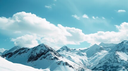 Majestic Snowy Mountain Range Under Clear Blue Sky