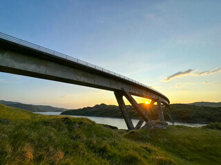 Sunset under the curve of the Kylesku Bridge, Scotland