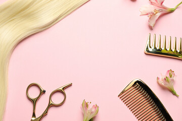 Hairdresser tools. Blonde hair lock, combs, scissors and flowers on pink background, flat lay....