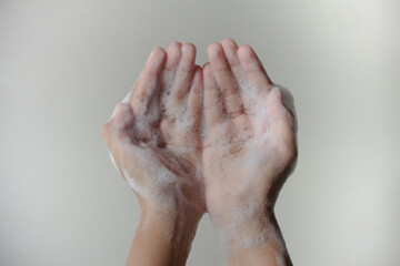Fototapeta premium Hands with soap foam