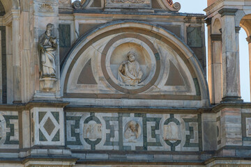 Close up  of Certosa di Pavia monastery, details of the statue on the right side facade of the...