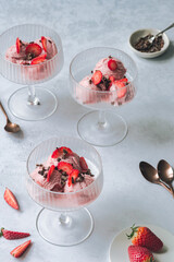 strawberry ice cream dessert in glasses, gelato, ready to eat