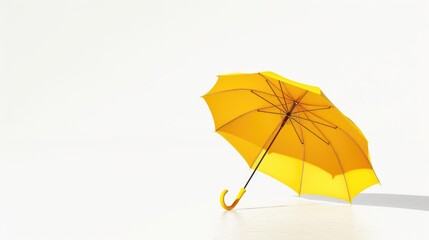 Bright yellow umbrella on clean white floor, suitable for various concepts