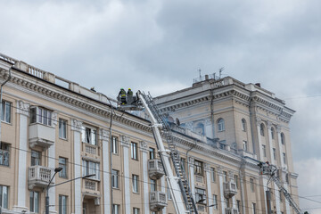 Obraz premium A Russian missile hit a residential building in the city of Dnepr, Ukraine. Damaged apartment building after a massive missile attack on 04/19/24. Scars of war. Consequences of the attack