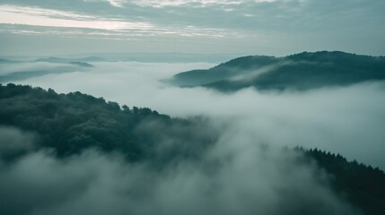 Fototapeta premium Mystical Mountains: Veiled in Ethereal Fog