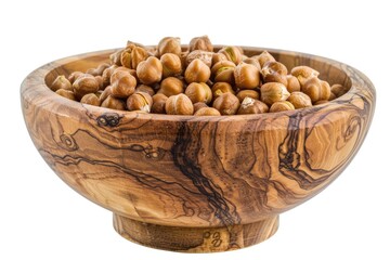 A wooden bowl filled with a variety of nuts. Perfect for food and nutrition concepts