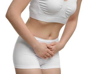 Woman suffering from cystitis on white background, closeup