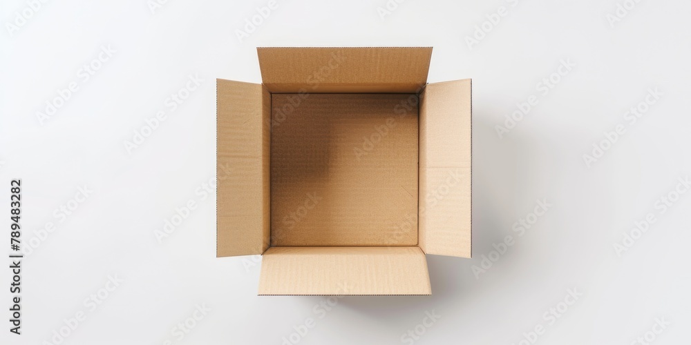 Poster An open cardboard box on a white surface, suitable for various concepts and projects