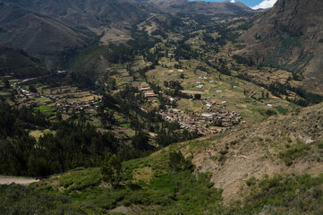 Image shows part of the beautiful city of Pisac surrounded by vegetation in the sacred valley of the Incas - obrazy, fototapety, plakaty