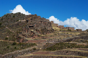 Complex of well-preserved ruins on top of a hill in the citadel of Pisac in Peru - obrazy, fototapety, plakaty