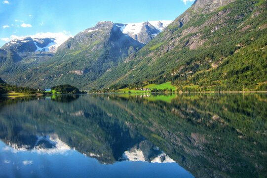 View of Geiranger fjord from the boat, Western fjords, Norway. Hardanger fjord landscape. Scandinavian mountains of Sunnylvsfjorden canyon
