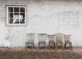 Fototapeta na wymiar A family of old chairs.