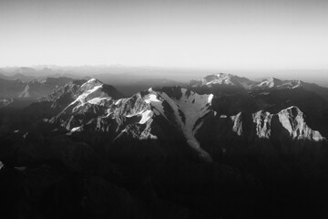 Mountains in black and white. Dramatic aerial view of the Andes mountain range, with beautiful...